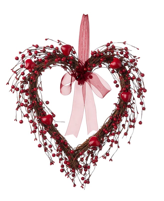 This berry heart wreath is a beautiful Valentine's Day decoration.