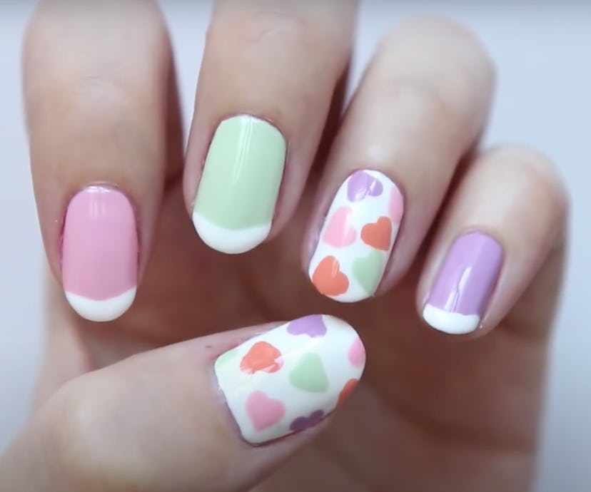 Close up of manicure; pastel colors with heart accents
