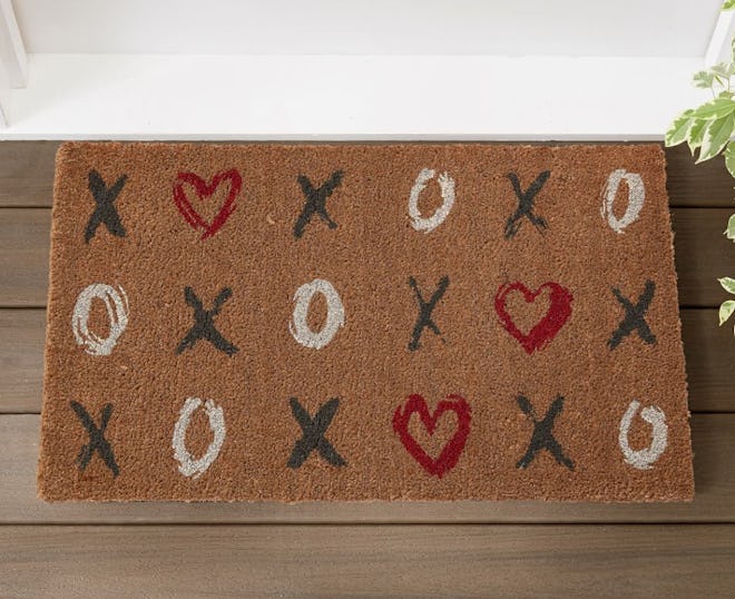This Valentine's Day doormat is a lovely home decoration.