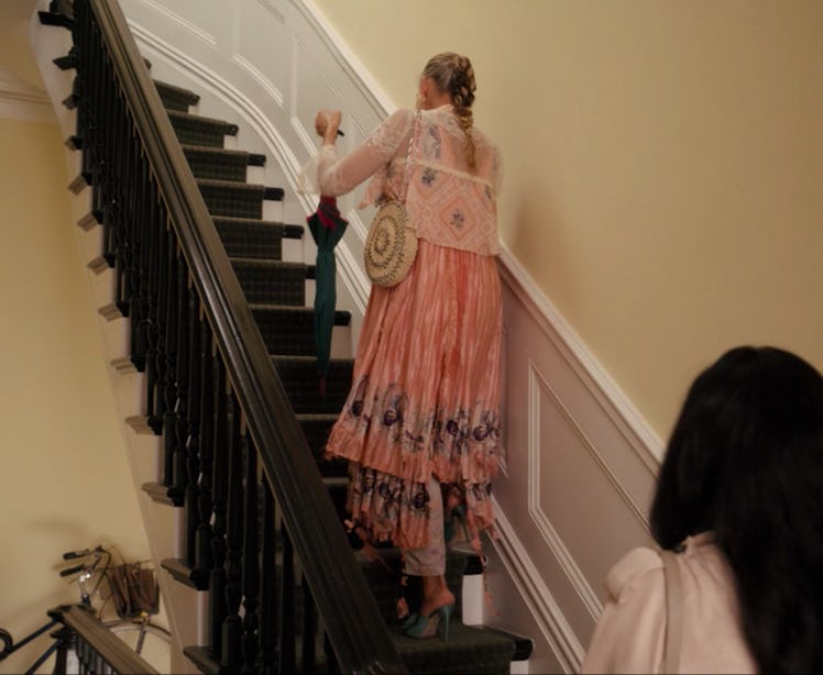 Carrie climbing the stairs in And Just Like That...