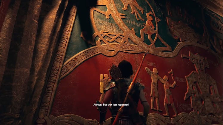 Atreus attempting to make sense of the mural he and his father discovered at the end of God of War.