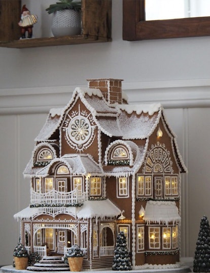 beautiful gingerbread mansion with elaborate decor