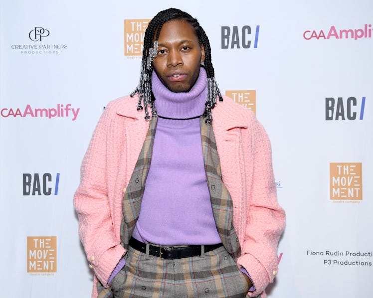 Jeremy O. Harris in a pink coat at the theater district