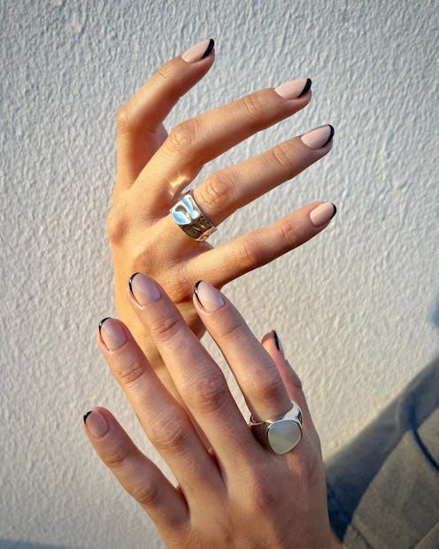 If you're into minimalist nail art, try swirls or different colors of French tips.