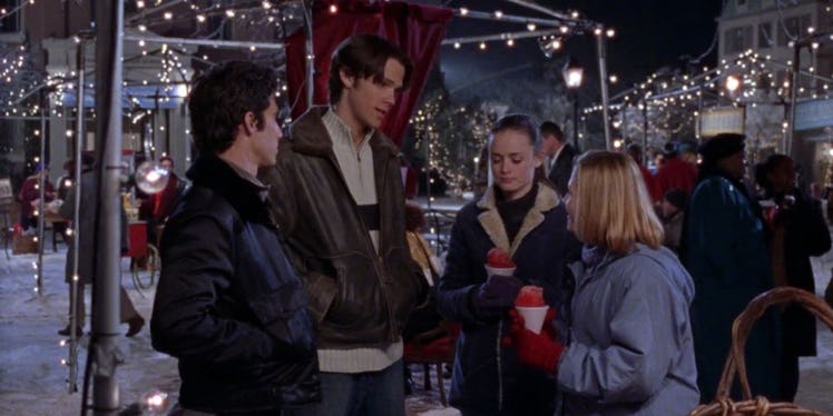 Rory, Dean, and Jess have a Gilmore Girls snow moment at the winter carnival.