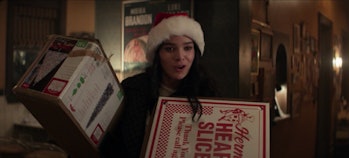 Hailee Steinfeld holding a pizza box in Hawkeye Episode 4
