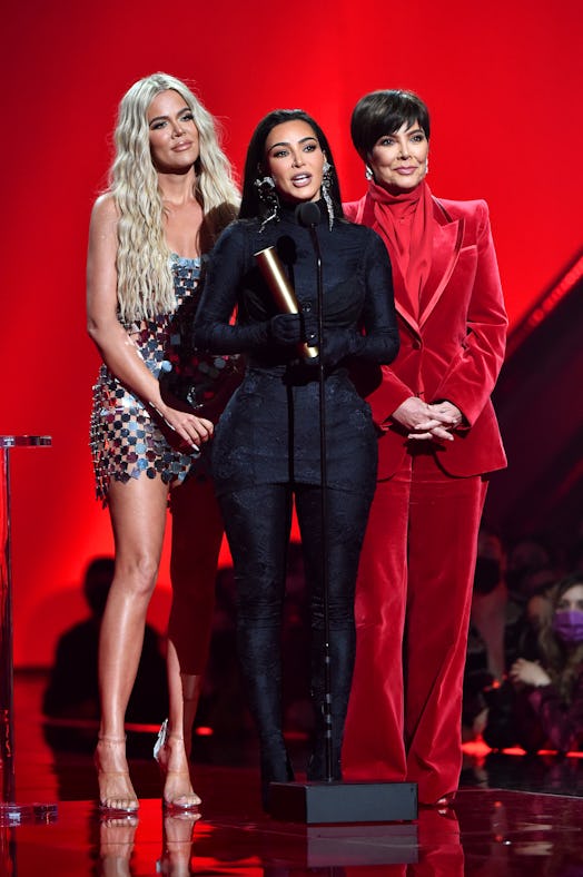 Khloé Kardashian, Kim Kardashian West, and Kris Jenner accepting The Reality Show of 2021 award