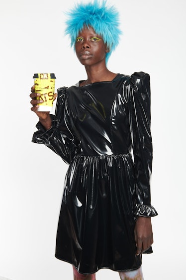 Batsheva black latex dress with blue wig and coffee cup