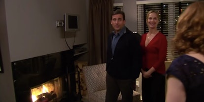 Michael (Steve Carell) shows off his plasma TV to Jim (John Krasinski) and Pam (Jenna Fischer) on an...