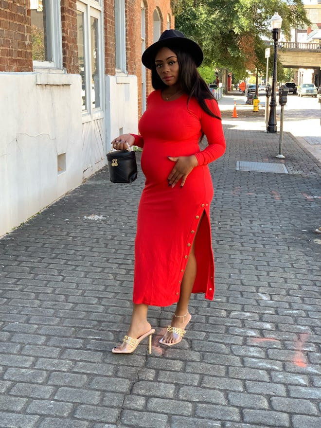red maternity dress with buttons on a slit