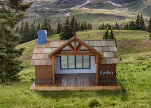 Vrbo's customized doghouses include a luxe cabin that looks like a chalet.