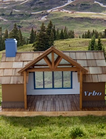 Vrbo's customized doghouses include a luxe cabin that looks like a chalet.