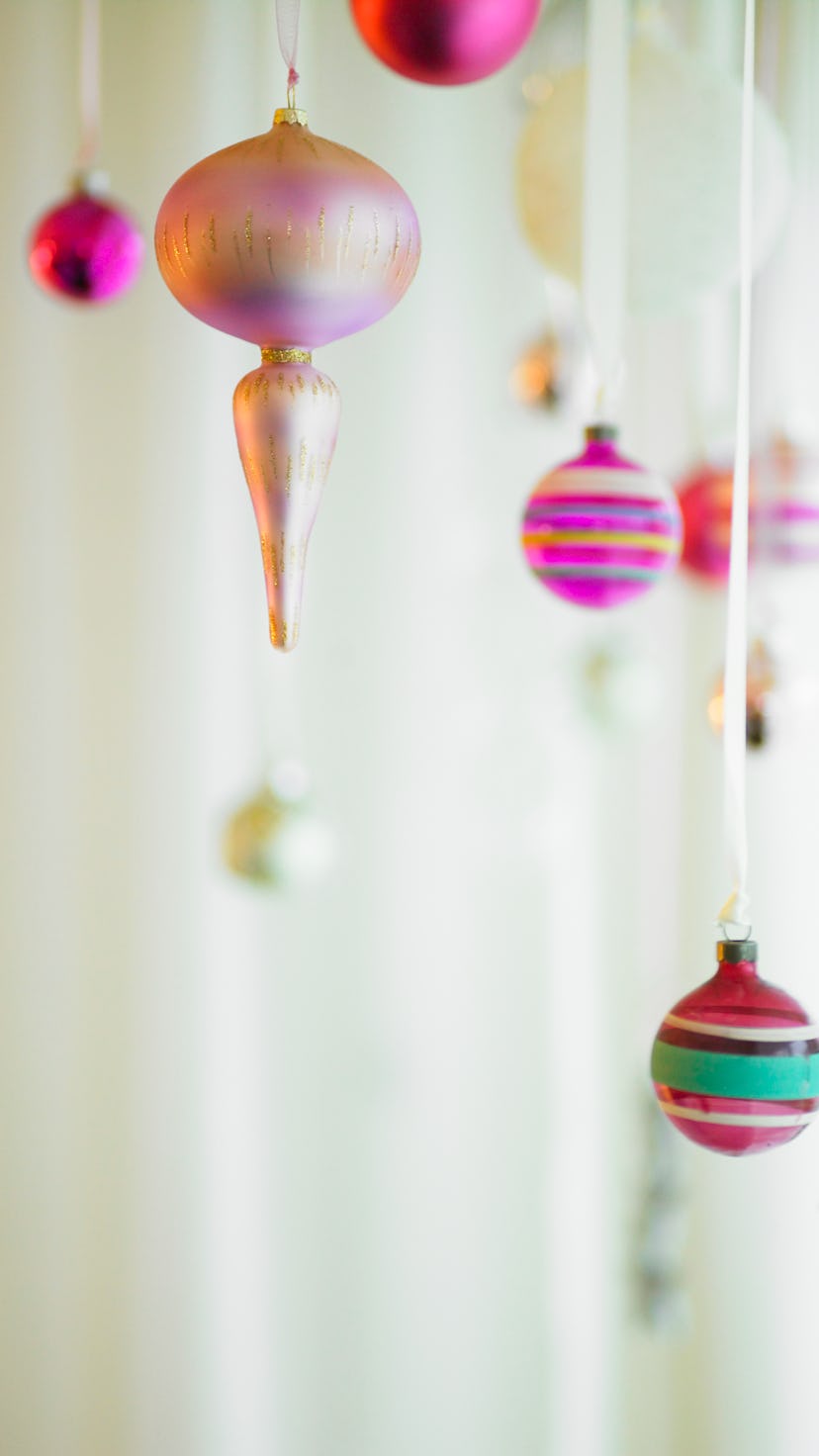 vintage glass ornaments hanging from ribbon