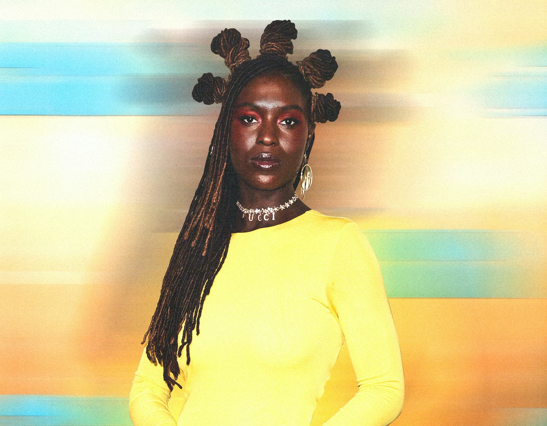 Jodie Turner-Smith wearing yellow dress