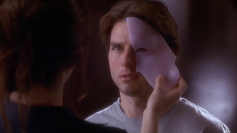 A woman removing a mask from Tom Cruise's face, who is playing David Aames in the Vanilla Sky romanc...