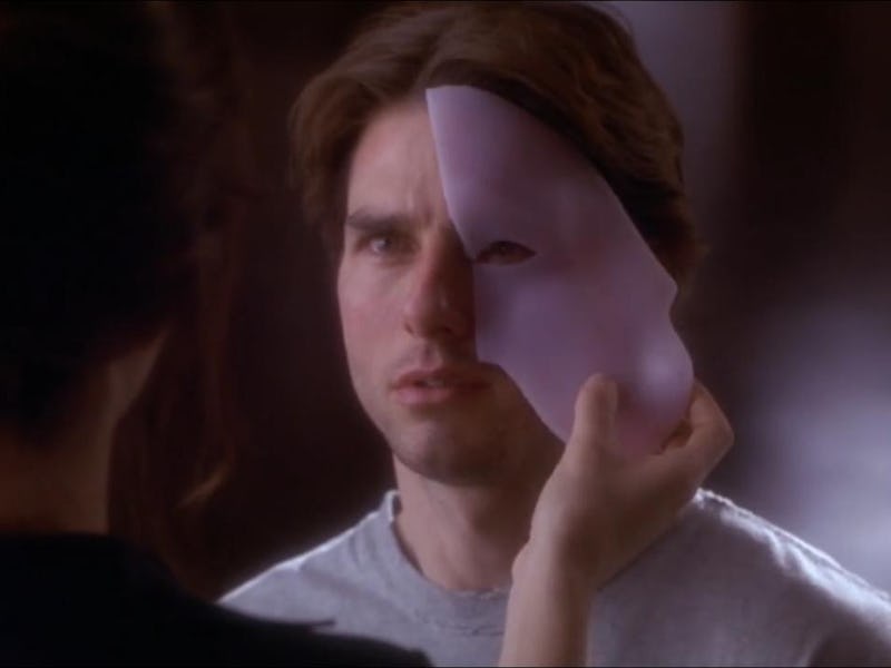 A woman removing a mask from Tom Cruise's face, who is playing David Aames in the Vanilla Sky romanc...