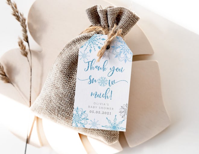 Party favor bag with a tag that says "thank you snow much"