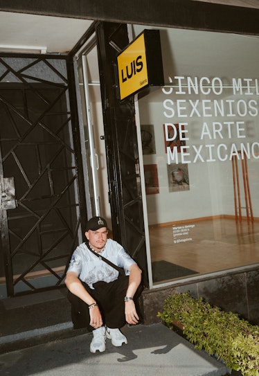 Luis Muñoz, in front of Luis gallery.