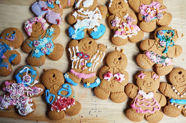 Decorated gingerbread cookies scattered on a table