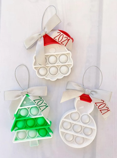 These holiday-themed pop-its are actual ornaments. 