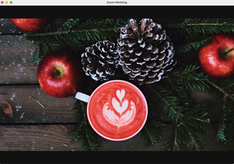 These winter Zoom backgrounds include pretty pinecones and apples.