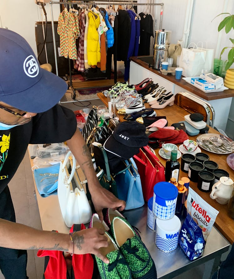 Lead Accessories Assistant Amir La Sure lays out items for our gift guide.