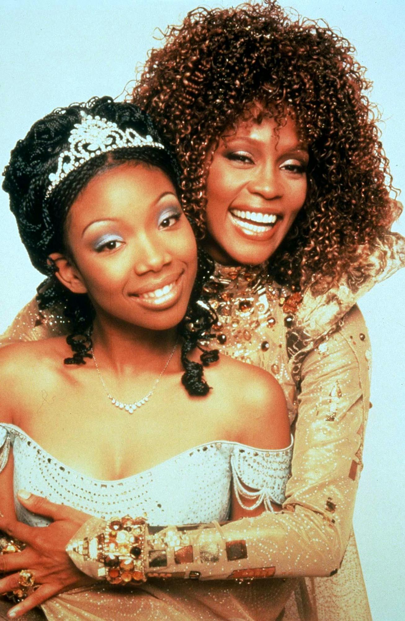 Brandy recalled choosing to wear braids for her role in 'Cinderella' opposite Whitney Houston.