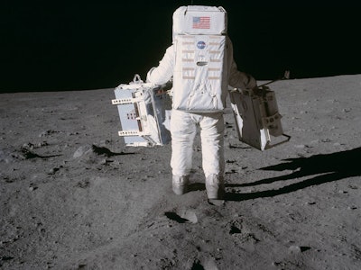 NASA astronaut hiking on the Moon