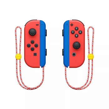 The Joy-Cons for the Mario-themed Nintendo Switch can be seen suspended in the air. The external par...