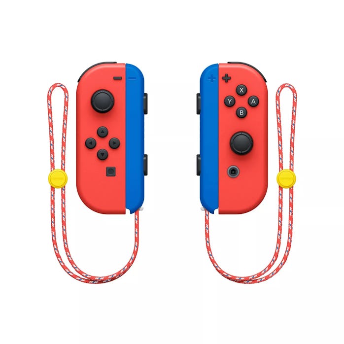 The Joy-Cons for the Mario-themed Nintendo Switch can be seen suspended in the air. The external par...