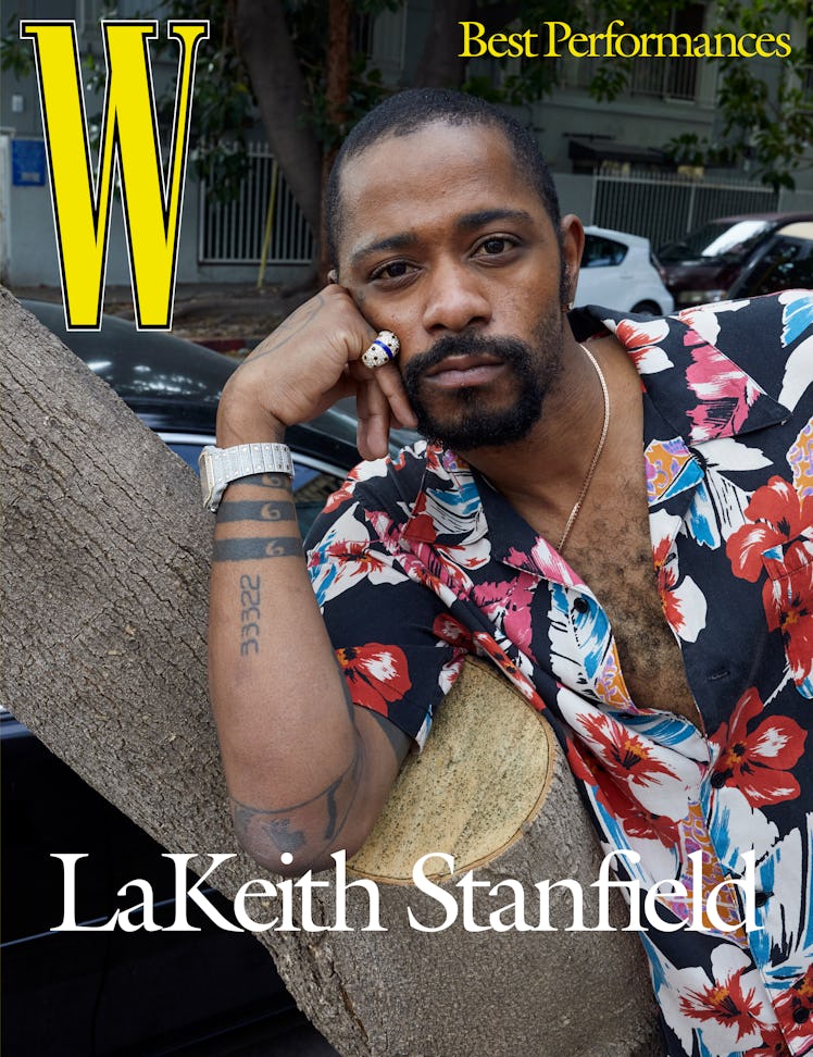 Stanfield wears a Saint Laurent by Anthony Vaccarello shirt; Cartier ring and his own Cartier watch;...