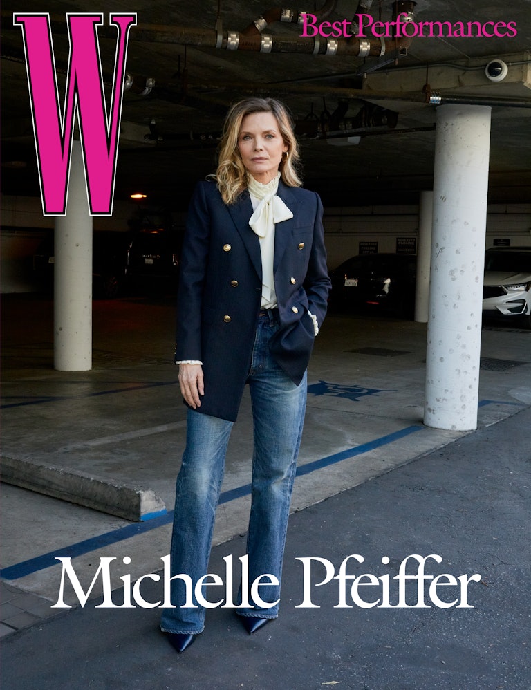 Pfeiffer wears a Saint Laurent by Anthony Vaccarello blazer and blouse; Celine by Hedi Slimane jeans; Cartier earrings; Jimmy Choo shoes.