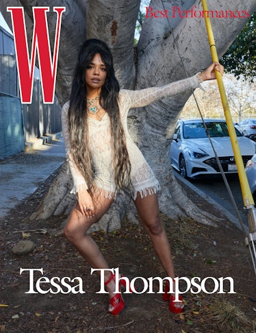 Thompson wears a Dior romper, bralette, and briefs; Cartier necklace and ring; Giuseppe Zanotti shoe...