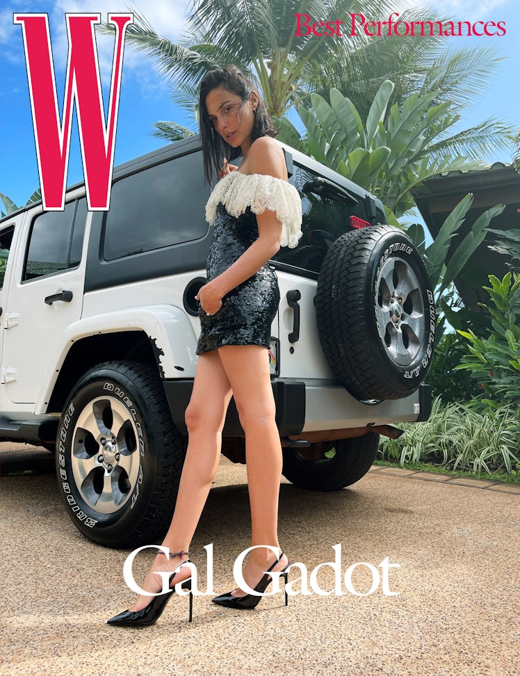 Gadot wears a Saint Laurent by Anthony Vaccarello dress and shoes; her own jewelry.