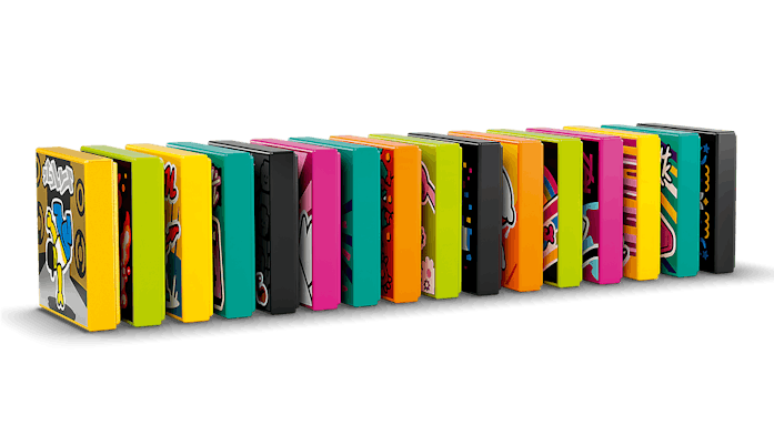 Multicolored Lego 'BeatBits' are standing in a row like dominos 
