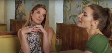 Twyla and Alexis gossip and talk dating tips at Café Tropical in 'Schitt's Creek.'
