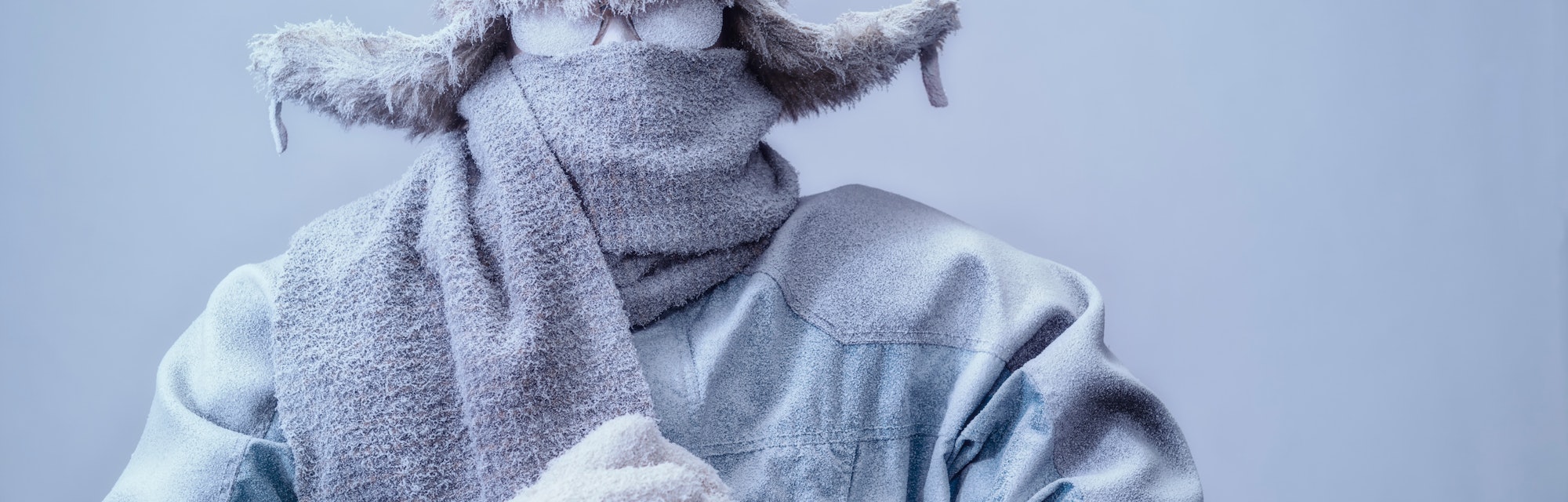 man in snow, cold weather