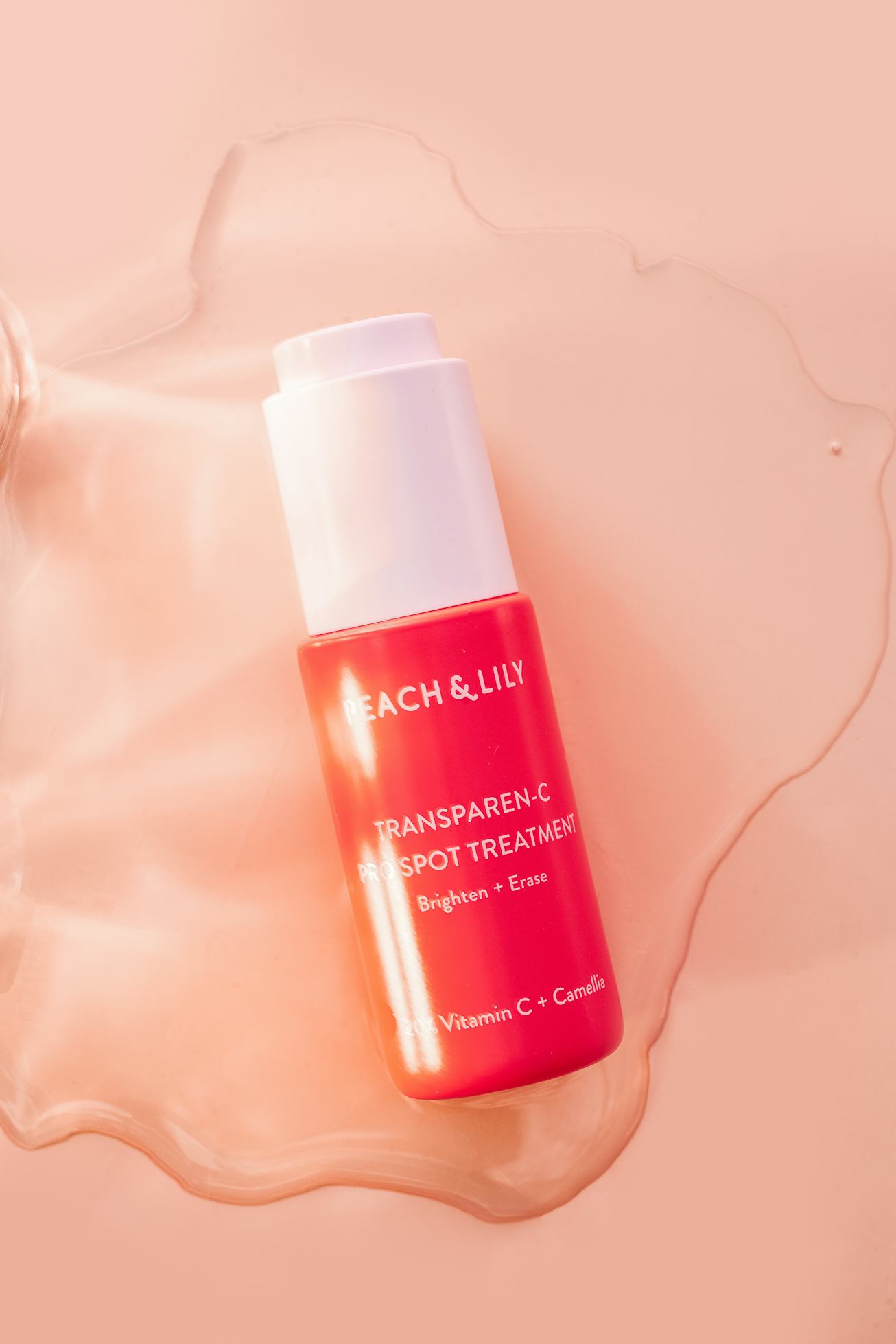 Peach & Lily's new Transparen-C Pro Spot Treatment in orange bottle.