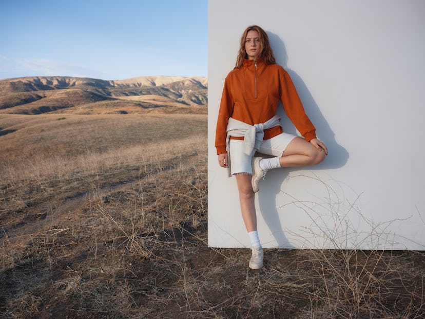 Model wears clothing from Everlane's Track Collection.