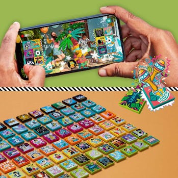 A person films Lego blocks on their smartphone for Vidiyo