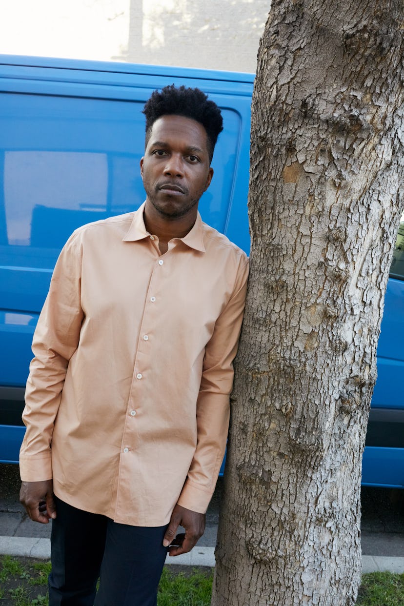 Leslie Odom Jr. wears a Salvatore Ferragamo shirt and pants.