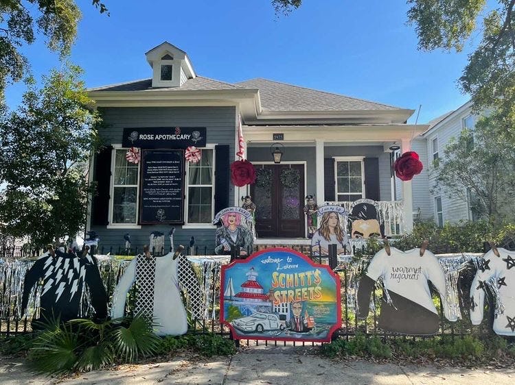 A house is decorated like 'Schitt's Creek' for Mardi Gras.