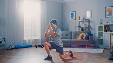 Man exercising at home.