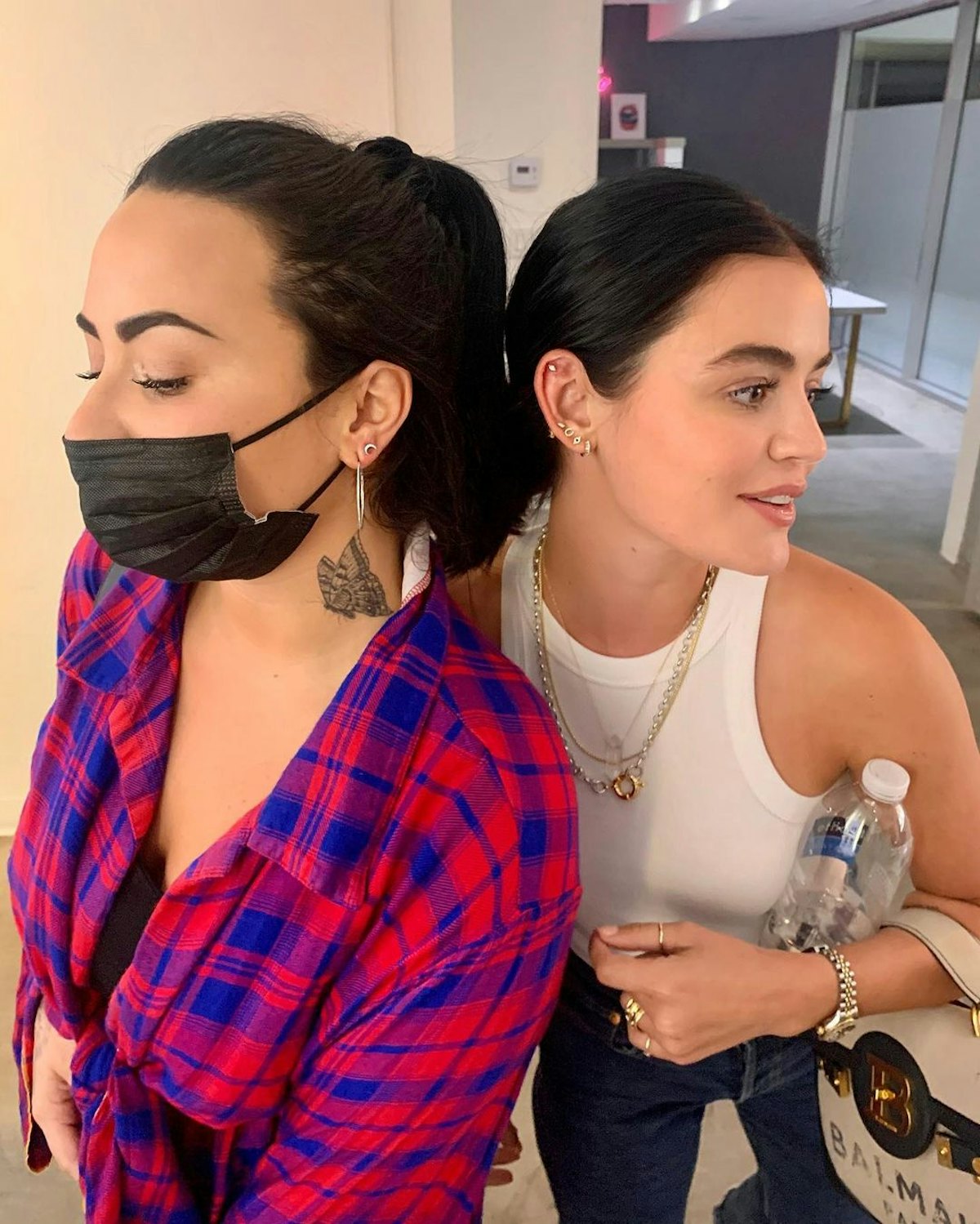 Demi Lovato and Lucy Hale got ear piercings together. 