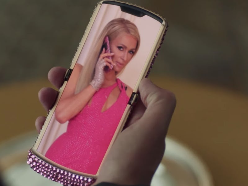 Paris Hilton is seen on a Razr screen talking to comedians for a Christian Cowan ad. 