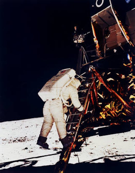 Aldrin climbs down Apollo lander to Moon