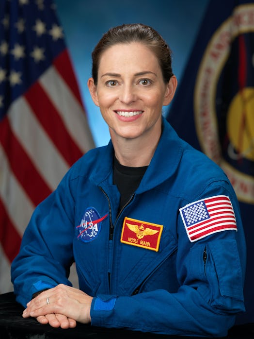 Nicole Mann portrait image in NASA uniform