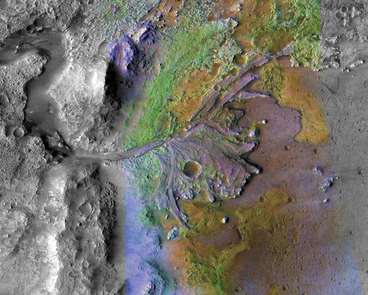 A satellite view of Jezero Crater showing river channels spilling into it. 