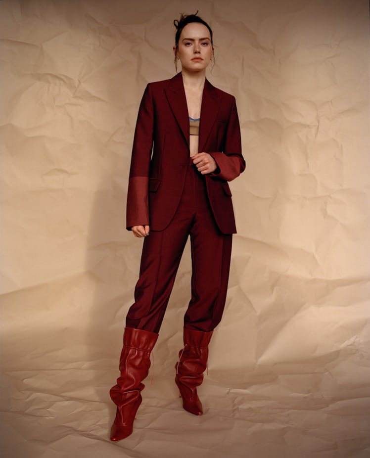 Daisy Ridley in Roksanda jacket, pants, and boots, Emilia Wickstead bralette, Araks bra (worn under)...