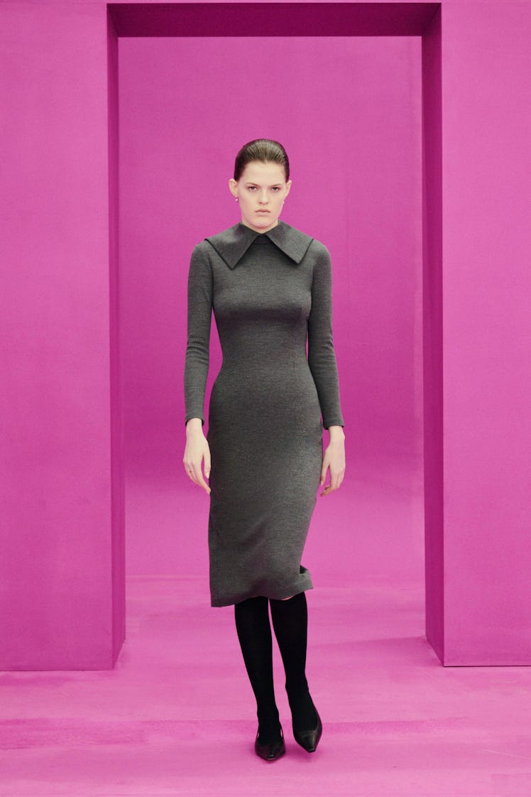 A model in an Emilia Wickstead black dress at the London Fashion Week